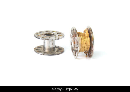 Metal spool of thread isolated on white background. Stock Photo