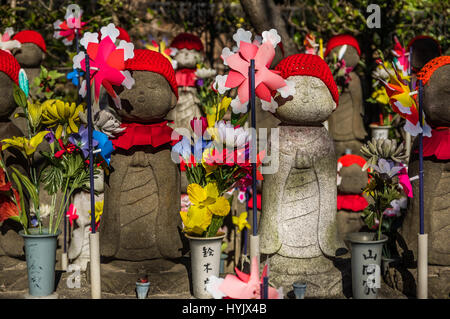 Tiny guardians - Jizo statues at a temple in Japan are the guardians of children Stock Photo