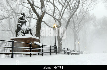 Sculpture of Robert Burns in Central Park during a snowfall. Stock Photo