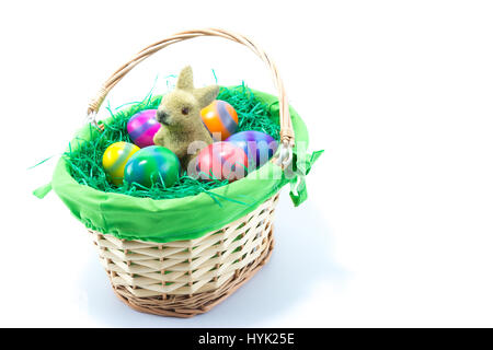 Basket with Easter Bunny and six hand painted chicken eggs Stock Photo
