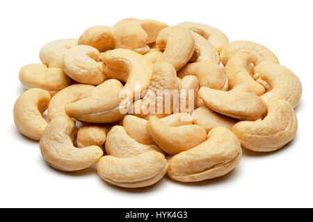 Closeup of cashew nuts, isolated on the white background, clipping path included. Stock Photo