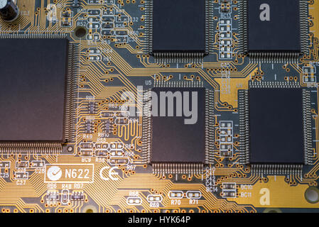 Close up photo of electronic components on circuit board Stock Photo