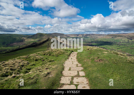 Paved path on Lose Hill, view along the great ridge to Mam Tor in the Peak District national park, England. Stock Photo