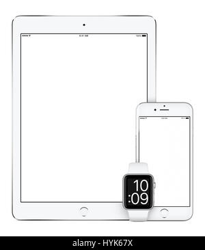 Responsive mockup consisting of vertical white tablet pc, mobile smartphone and smart watch. All gadgets in focus. Isolated on white background. Techn Stock Photo