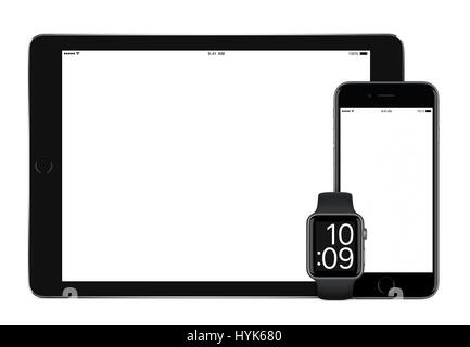 Responsive mockup consisting of black tablet pc, mobile smartphone and smart watch. All gadgets in focus. Isolated on white background. Technology set Stock Photo