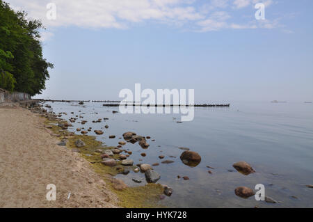 summer foggy cloudy day on the beach at the baltic sea coast in Gdynia, Poland Stock Photo