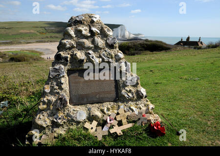 A simple flint memorial to commemorate the deaths of Canadian troops, machine-gunned at Cuckmere Haven in 1940. Fact, hoax or mis-information? Stock Photo