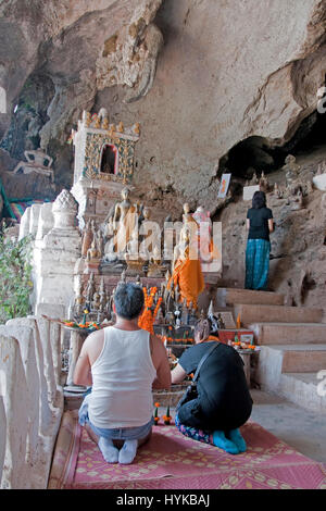 Pak Ou Buddhist Caves on Mekong River north of Luang Prabang are filled with images of Buddha. Stock Photo