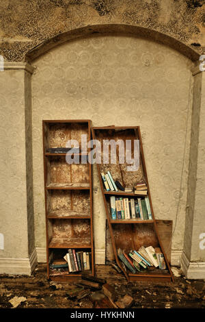 MALVERN, ENGLAND: A picture of collapsing bookshelves. LOOK INSIDE the home where heroic nurse Florence Nightingale believed her life was saved upon returning to Britain from her service during the Crimean War. Pictures show the one time centre for ‘water cure’ treatment in Malvern, Malvernbury, which became a frequent stop for Florence Nightingale between 1857 and 1860 while she recovered from the effects of war which left her suffering severe anxiety and exertion. Another famous convert to Malvern’s water cure included Charles Darwin who stated after four months of treatment, ‘I consider the Stock Photo