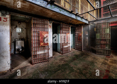 WEST VIRGINIA, USA: A picture of the maximum security wing. IS THIS “haunted” former-prison once used to electrocute prisoners to death the most disturbing tourist attraction in the world? Hair-raising pictures reveal the internal workings of the now decommissioned West Virginia State Penitentiary (WVSP), including ‘Old Sparky’, the sadistically named electric chair built by a prisoner, yet used to kill nine inmates. Pictures also include the isolation room, the cell block, the lunch room, maximum security cell as well as the administration building and visitor centre. Built in 1866 this gothi Stock Photo