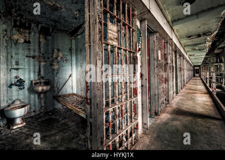 WEST VIRGINIA, USA: A picture showing the inside of a typical cell. IS THIS “haunted” former-prison once used to electrocute prisoners to death the most disturbing tourist attraction in the world? Hair-raising pictures reveal the internal workings of the now decommissioned West Virginia State Penitentiary (WVSP), including ‘Old Sparky’, the sadistically named electric chair built by a prisoner, yet used to kill nine inmates. Pictures also include the isolation room, the cell block, the lunch room, maximum security cell as well as the administration building and visitor centre. Built in 1866 th Stock Photo
