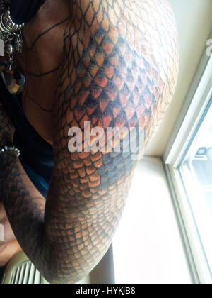 10 Best Reptile Skin Tattoo Designs  Scale tattoo Reptile skin Tattoos