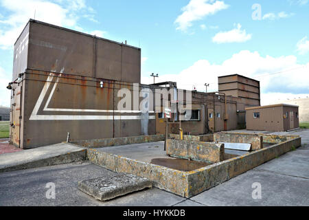 UPPER HEYFORD, UK: WELCOME to the abandoned RAF base where both Roger Moore and Brad Pitt starred in movies where they single handedly saved the world. Haunting pictures of the one-hundred-year old base show the slowly decaying facilities at RAF Upper Heyford, which is one of the oldest military air force bases on the planet and was the centre of US airpower in Europe during WW2. Images show a rusting generator, ammunition boxes and heavy metal sheet buildings still in place and where the movie blockbusters such as Bond film, Octopussy and Zombie flick, World War Z were both filmed. Other shot Stock Photo