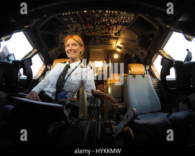 A BLONDE bombshell pilot has been documenting her sizzling hot globe-trotting lifestyle with a series of cockpit selfies that have launched her into Instagram stardom. With 126 thousand Instagram followers and climbing, awesome pictures show Maria Pettersson (32) hanging out a cockpit window, sitting inside an aircraft engine turbine and operating the controls in preparation for take-off. Other images show the Swedish pilot’s airplane lunch, relaxing as she practices yoga on a sunny beach and taking some time out to paddle board. Maria, from Gothenburg in Sweden but now living in Palermo in Si Stock Photo