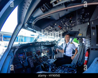 A BLONDE bombshell pilot has been documenting her sizzling hot globe-trotting lifestyle with a series of cockpit selfies that have launched her into Instagram stardom. With 126 thousand Instagram followers and climbing, awesome pictures show Maria Pettersson (32) hanging out a cockpit window, sitting inside an aircraft engine turbine and operating the controls in preparation for take-off. Other images show the Swedish pilot’s airplane lunch, relaxing as she practices yoga on a sunny beach and taking some time out to paddle board. Maria, from Gothenburg in Sweden but now living in Palermo in Si Stock Photo