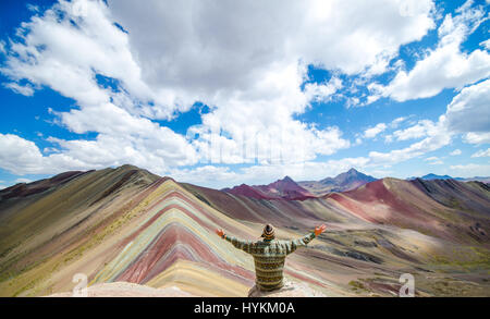 VINICUNCA MOUNTAIN, PERU: STUNNING pictures have revealed one of the world’s hidden gems as the remarkable multi-coloured landscape has saw this place dubbed Rainbow Mountain. The spectacular shots show the rainbow colours along the ridge of the 16,500ft Vinicunca Mountain and spilling below while other images illustrate the idyllic trek one must take to get there. Peru is best known for Machu Picchu, a 15th-century Inca citadel situated on a mountain ridge 7,970 ft above sea level, but Rainbow Mountain proves it is not all the country has to offer. The photos were taken by American traveler a Stock Photo