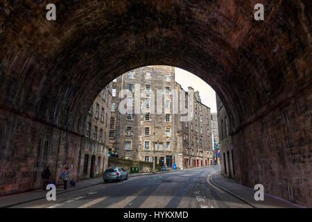 Edinburgh, UK - September 09, 2016: tunnel of the Regents Bridge with unidentified people. The bridge was designed by Archibald Elliot and completed i Stock Photo