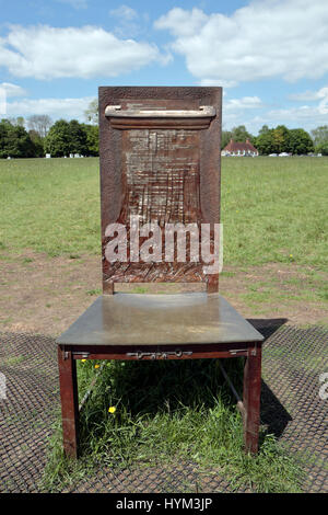 The shredding documents chair, part of 'The Jurors' artwork by Hew Locke in Runnymede, Surrey, UK. Stock Photo