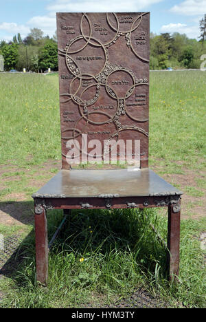 The 'Golden Rule' chair ,part of 'The Jurors' artwork by Hew Locke in Runnymede, Surrey, UK. Stock Photo