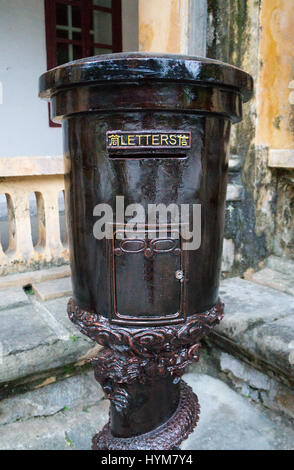 Vintage old dark metal postal mailbox in China Stock Photo