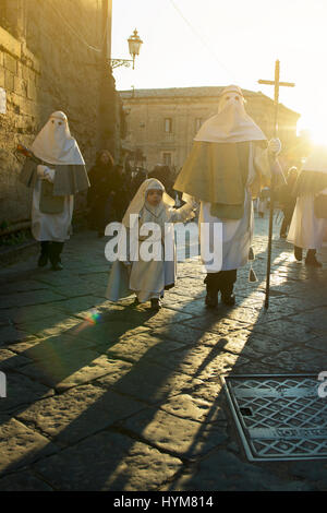 Enna, Sicily, Italy - March 25, 2016:  religious Parade, in town of Enna, Sicily for the Holy Easter which lasts through the afternoon and night. Stock Photo