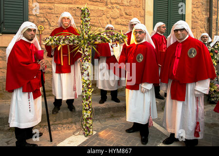 Enna, Sicily, Italy - March 25, 2016:  religious Parade, in town of Enna, Sicily for the Holy Easter which lasts through the afternoon and night. Stock Photo