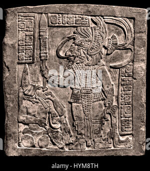The Yaxchilan Lintels - Classic Maya  755-770 AD  Lintel 16 Bird Jaguar IV and a captive at his feet. His captive carries a broken parasol in his right hand.  ( The Mayans - Maya civilization was a Mesoamerican civilization in Yucatán  Mexico and Belize in Central America ( 2600 BC - 1500 AD ) Pre Columbian American ) Stock Photo