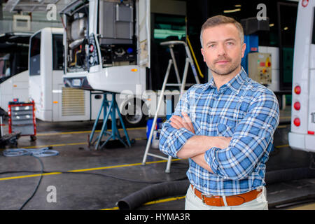 Portrait of man in bus depot Stock Photo