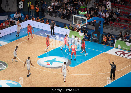Vitoria, Spain - February 19, 2017: Some basketball players in action at Spanish Copa del rey final match between Valencia and Real Madrid. Stock Photo