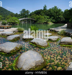 Ritsurin-koen garden, Takamatsu, Japan. A traditional path made from ...