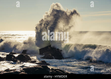 Big waves smashing on rocks of Atlantic Ocean shore in Nevogilde civil parish of Porto, second largest city in Portugal Stock Photo