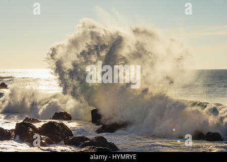 Big waves smashing on rocks of Atlantic Ocean shore in Nevogilde civil parish of Porto, second largest city in Portugal Stock Photo