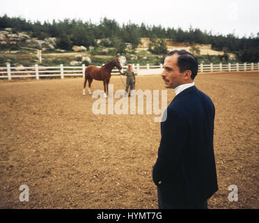 HUSSEIN bin Talal al-Hashemi 1970 King of Jordan at the horse paddock Stock Photo