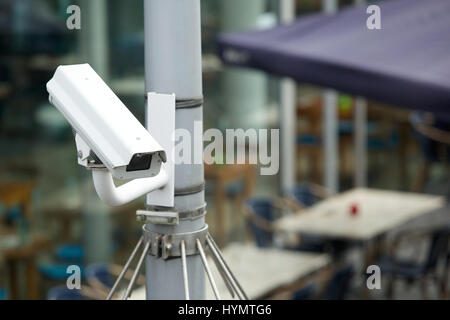 Security camera system attached to a pole outdoors Stock Photo