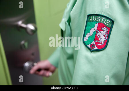 Prison guard unlocking jail cell, Düsseldorf prison, North Rhine-Westphalia, Germany Stock Photo