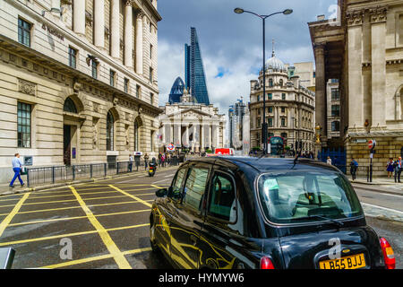 London, United Kingdom - June 20, 2016:View on black London cab by Bank station in London Stock Photo