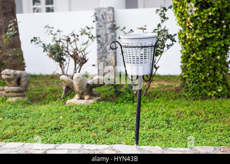 Trash can outdoor in park.Save nature concept related Stock Photo