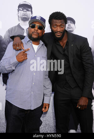 (L-R) MC Ren and Aldis Hodge attends the Straight Outta Compton world