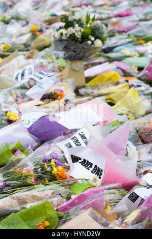 Floral Tributes in Westminster outside the houses of parliment after Terrorism attack by Khalid Masoods. London. 2017 Stock Photo