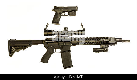 A modern semi auto hand pistol in 9mm and AR-15 rifle that is a good combination that swat personal would carry together. Stock Photo