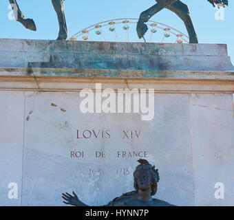 Allegorical statue representing river Saone at base of plinth of equestrian statue of Louis XIV, La Place Bellecour, Lyon Auvergne-Rhone-Alpes, France Stock Photo