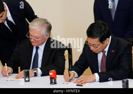 Yerevan, Armenia. 5th Apr, 2017. Chinese Ambassador to Armenia Tian Erlong (R) and Armenian Foreign Minister Edward Nalbandian sign on first-day covers in Yerevan, Armenia, April 5, 2017. A ceremony was held in Yerevan On Wednesday, hailing 25 years of the establishment of diplomatic relations between Armenia and the People's Republic of China. Credit: Gevorg Ghazaryan/Xinhua/Alamy Live News Stock Photo