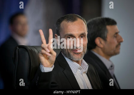 Tehran, Iran. 5th Apr, 2017. Presidential candidate Hamid Baghaie (front) gestures during a press conference with former Iranian president Mahmoud Ahmadinejad (back) in Tehran, Iran, on April 5, 2017. Iranian presidential election is slated for May this year. Credit: Ahmad Halabisaz/Xinhua/Alamy Live News Stock Photo