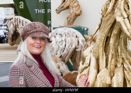 Liverpool, Merseyside, UK. 6th Apr, 2017. Rebecca Clarke, Bookmaker at the Aintree Grand National Festival. In light of previous years, when attendee's outfits have got attention for all wrong reasons, officials at the Grand National urged this year's racegoers to 'smarten up' to make the event more 'aspirational'. Credit; MediaWorldImages/AlamyLiveNews Stock Photo