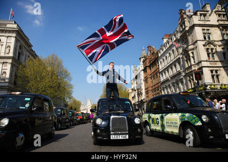 Whitehall. London. UK 6 Apr 2017. London Black Taxi drivers protest in London's Whitehall. The cabbies are demanding a parliamentary enquiry into the alleged relationship between former Prime Minister David Cameron and George Osborne and their links to private hire company Uber. Credit: Dinendra Haria/Alamy Live News Stock Photo