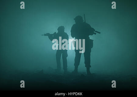 Black silhouettes of soldiers Stock Photo