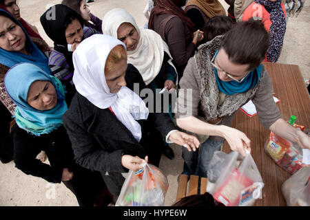 Malakasa refugiees camp in Greece. -  07/03/2017  -  Greece / Malakasa  -  Distribution of food items from the Popular Secours to the Malakasa refugee camp, home to 483 Afgans refugees, including 112 children.   -  Stefania Mizara / Le Pictorium Stock Photo