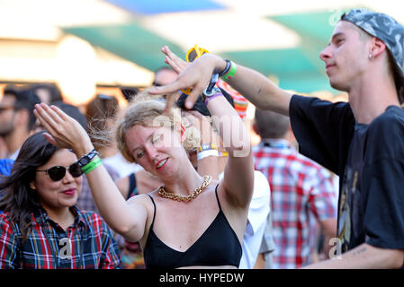 BARCELONA - JUN 18: People dance at Sonar Festival on June 18, 2015 in Barcelona, Spain. Stock Photo