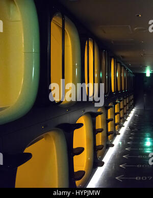 Tokyo, Japan - Interior of capsule hotel. Stock Photo