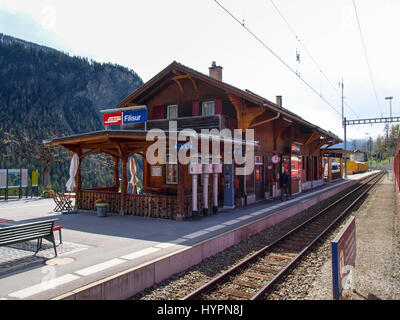 Filisur, Switzerland - April 27, 2016: The station built of wood went into operation in 1903 as part of the Albula line. Stock Photo